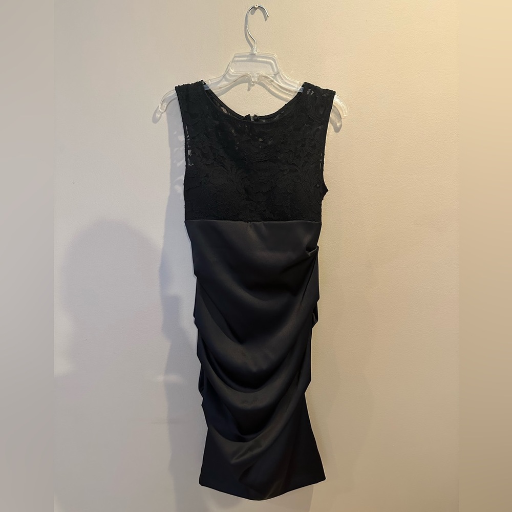 XSCAPE by Joanna Chen black satin and lace dress. Size 10 with built in bra